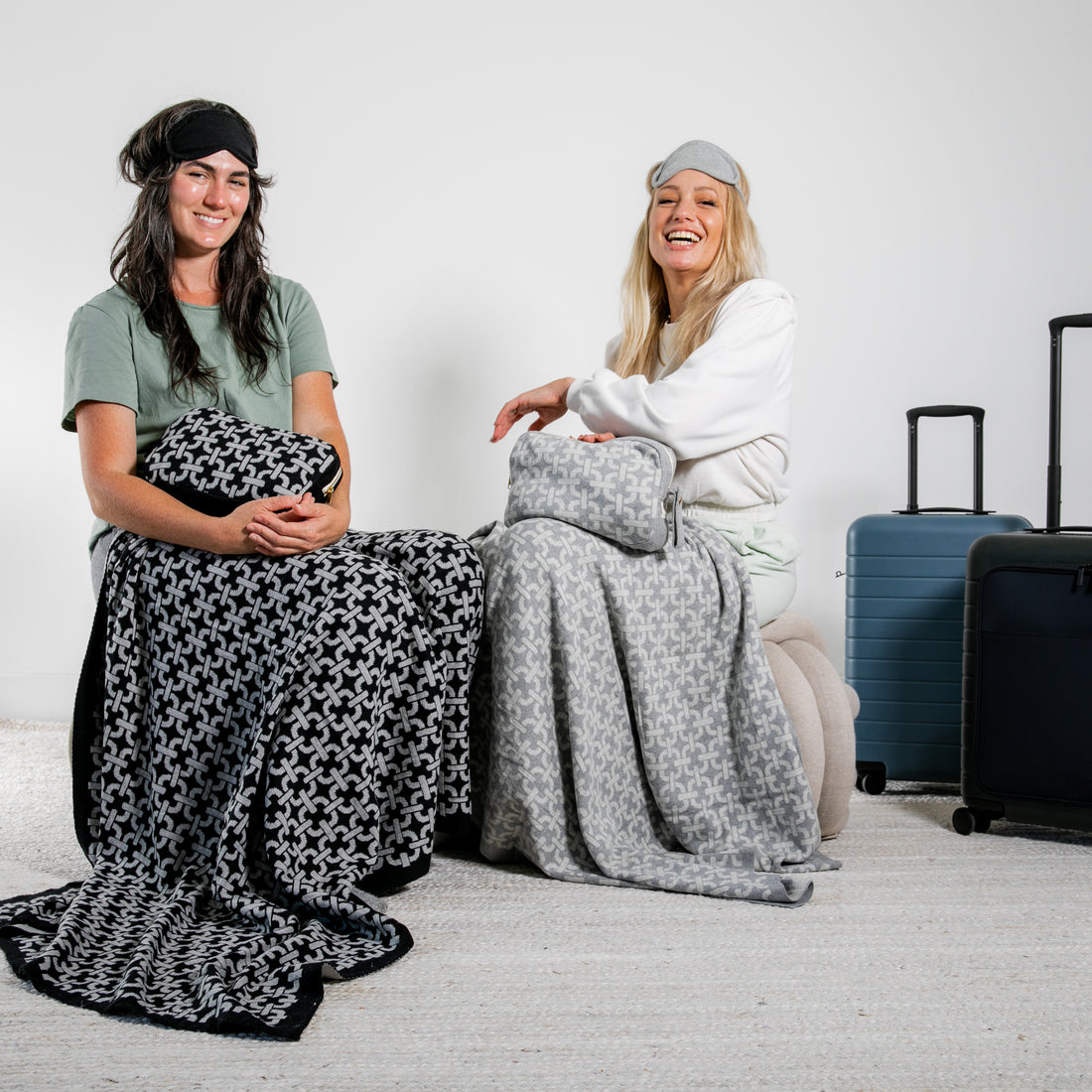 Soft black and white chain link cotton travel blankets with matching eye masks, perfect travel gifts for women.