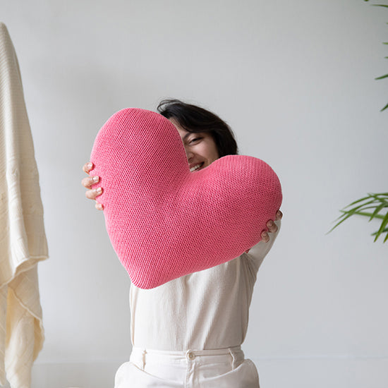 Cuddle Buddy Organic Cotton Heart Pillow soft knitted cotton heart cushion with plush texture for cozy bed styling