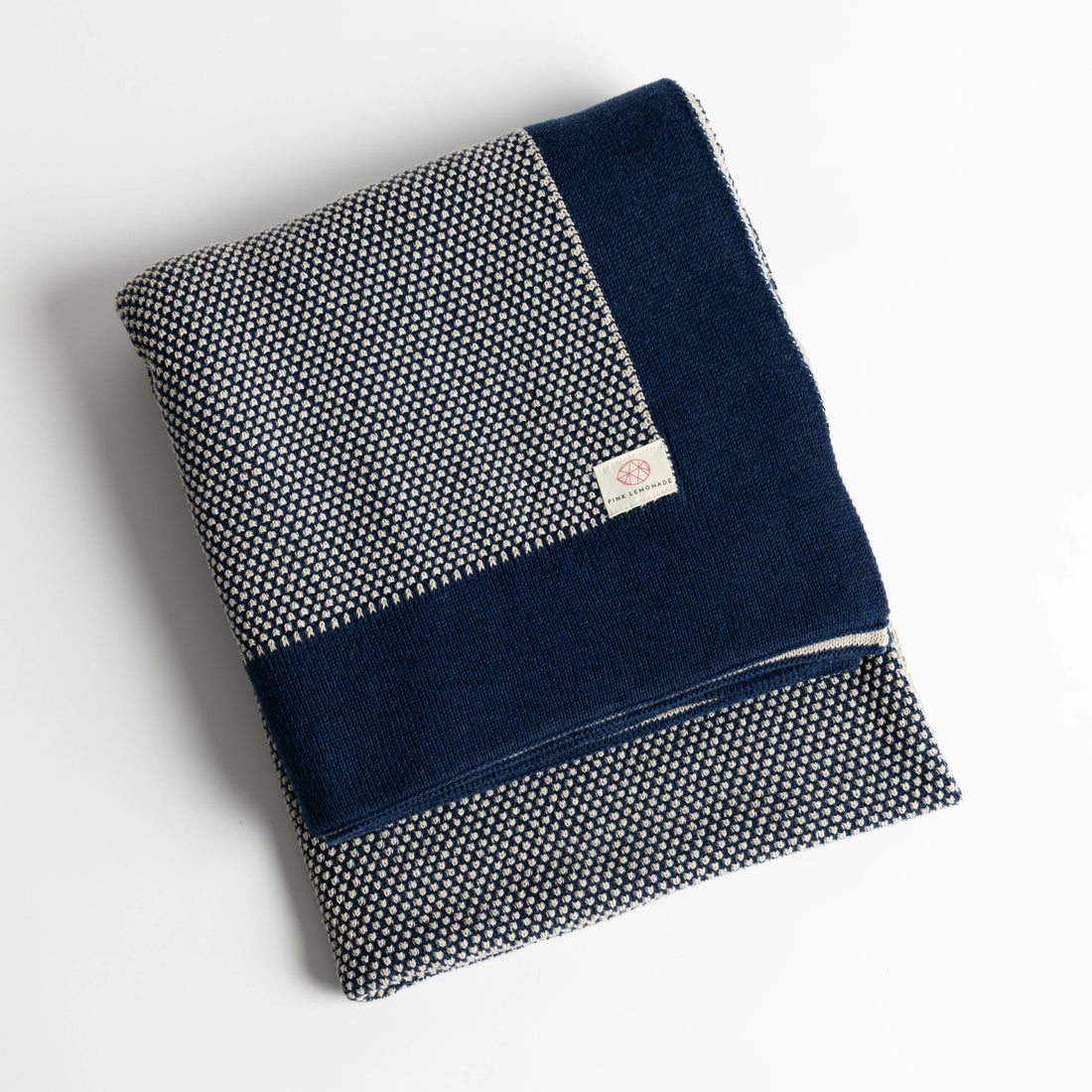 Eka Stipple Navy Organic Cotton Knit Throw Blanket
