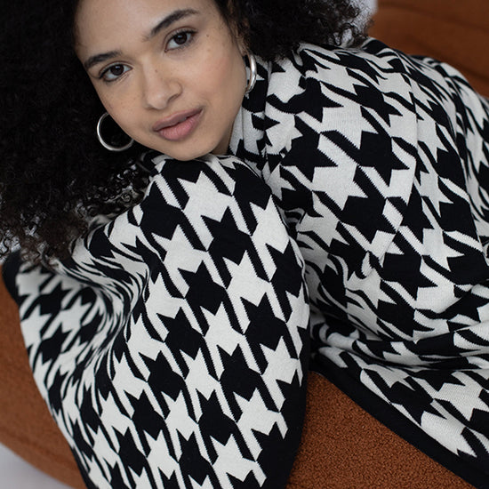 Houndstooth Organic Cotton Throw Blanket with classic woven pattern and soft breathable knit