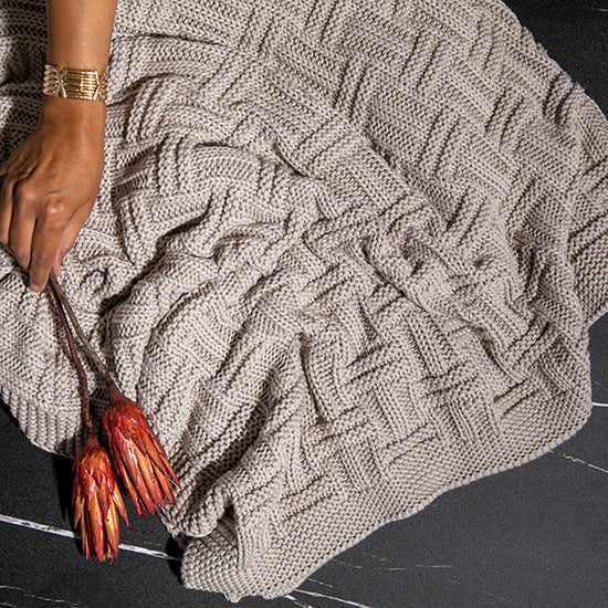 Istaka Organic Cotton Throw Blanket soft neutral organic cotton knit throw blanket perfect for cozy everyday comfort and elegant home styling