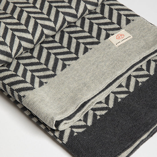 Zima Organic Cotton Throw Blanket soft breathable knit throw adding cozy warmth and decorative comfort for everyday lounging and gifting